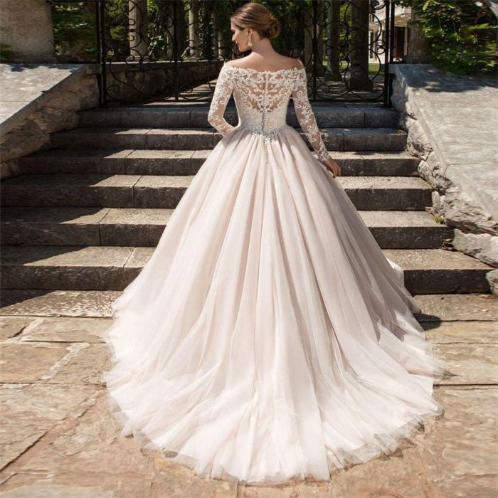 Blush wedding dress with sleeves